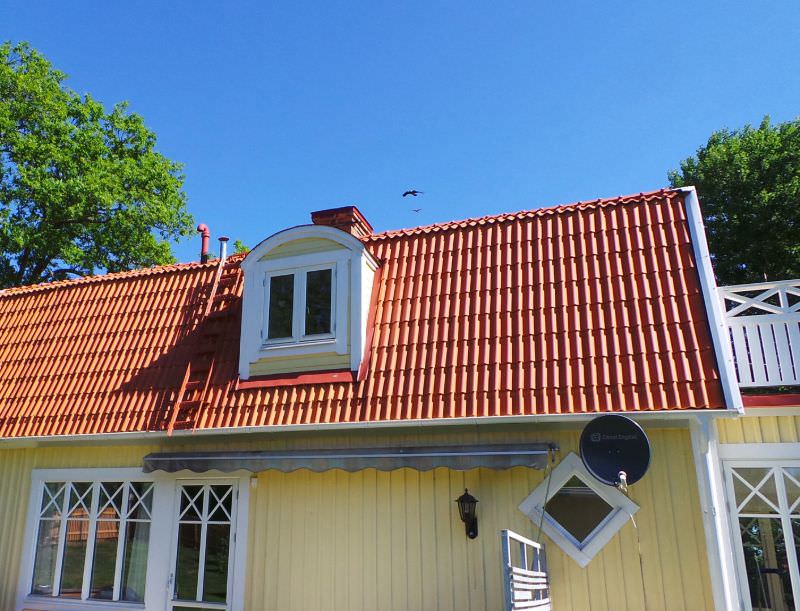 9. Renovering av tegeltak pa╠e 2 planshus